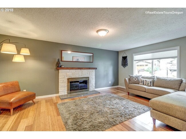Building Photo - Spacious 4-Bedroom Home with Multiple Livi...