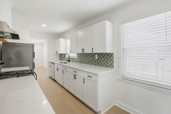 Building Photo - (Coming Soon) Beautifully Renovated 3-Bedroom with Fenced in Yard