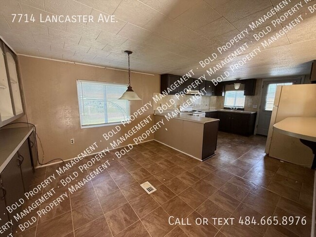 Building Photo - 7714 Lancaster Ave