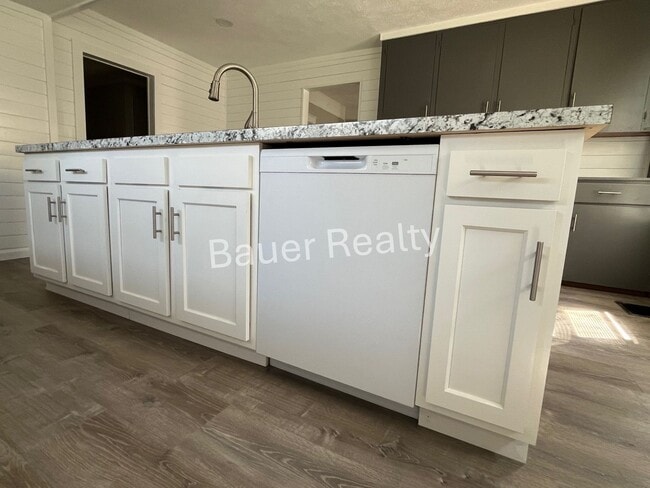 Building Photo - Renovated Three Bedroom Home