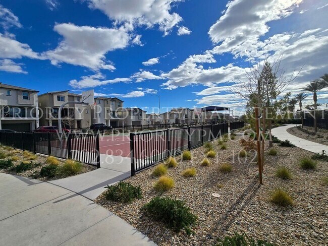 Building Photo - Gated~ 2 Bedroom Townhome w/2 Car Garage~MUST SEE!