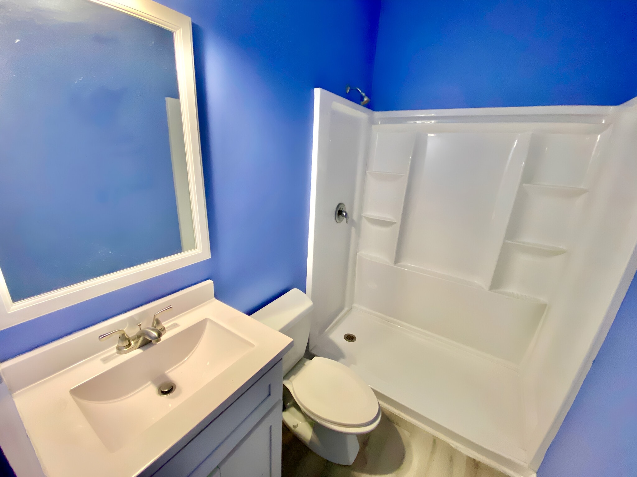 En-suite bathroom, new shower. - 4240 Wilshire Blvd