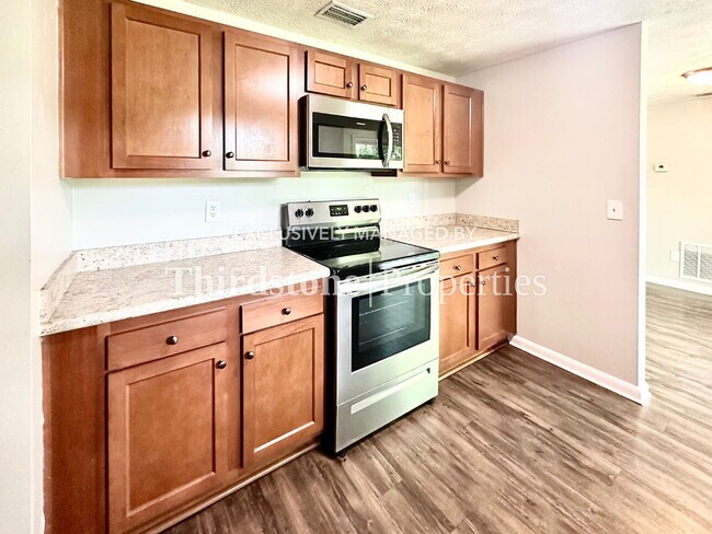 Building Photo - 4516 Key Woodley Dr S