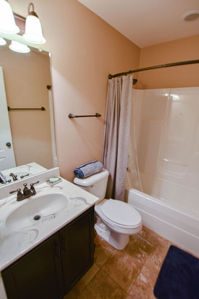 Building Photo - Pet Friendly Three Bedroom with Bonus!