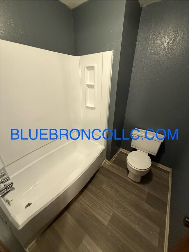 Building Photo - New flooring and fresh paint in this spaci...