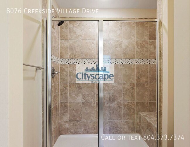 Building Photo - 8076 Creekside Village Dr