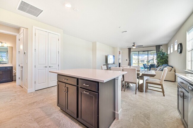 Building Photo - **Coach Home w/ Private Pool in Esplanade Lake Club **