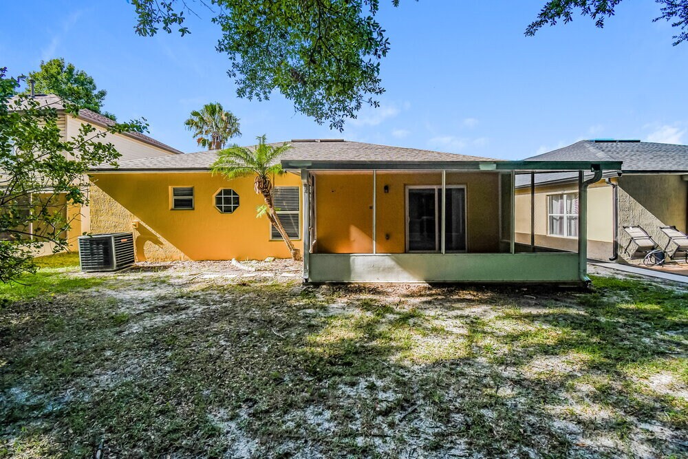 Building Photo - 7463 Lawn Tennis Ln
