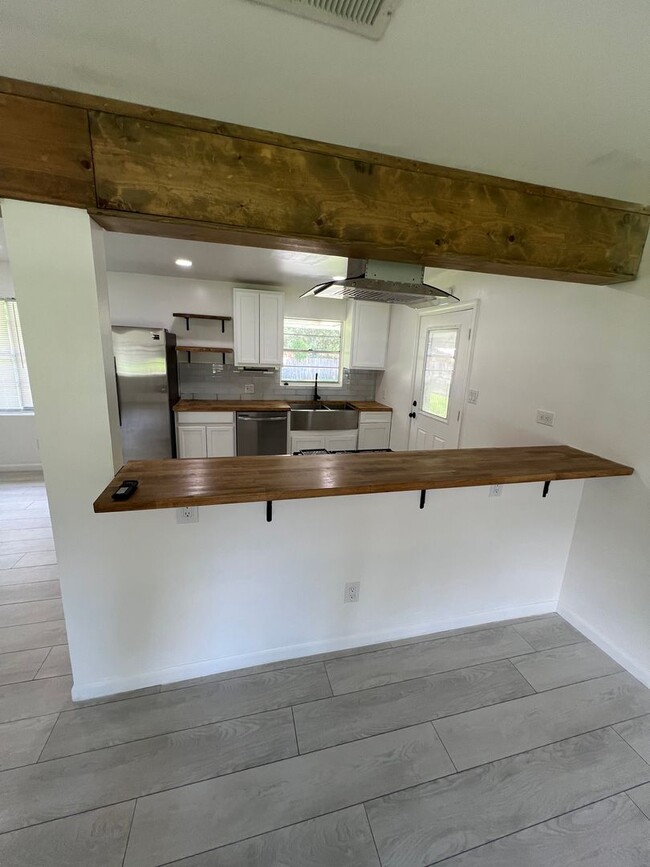 Building Photo - Updated 3BR | Solar Panels + Fenced Yard