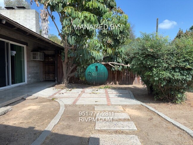 Building Photo - Riverside Duplex Retreat – Water Included!