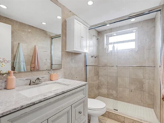 Building Photo - 5005 Collins Ave