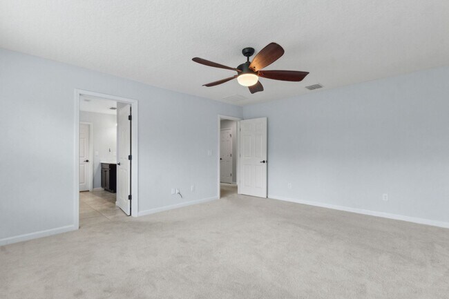 Building Photo - Spacious 4-Bedroom Home in Amelia Walk wit...
