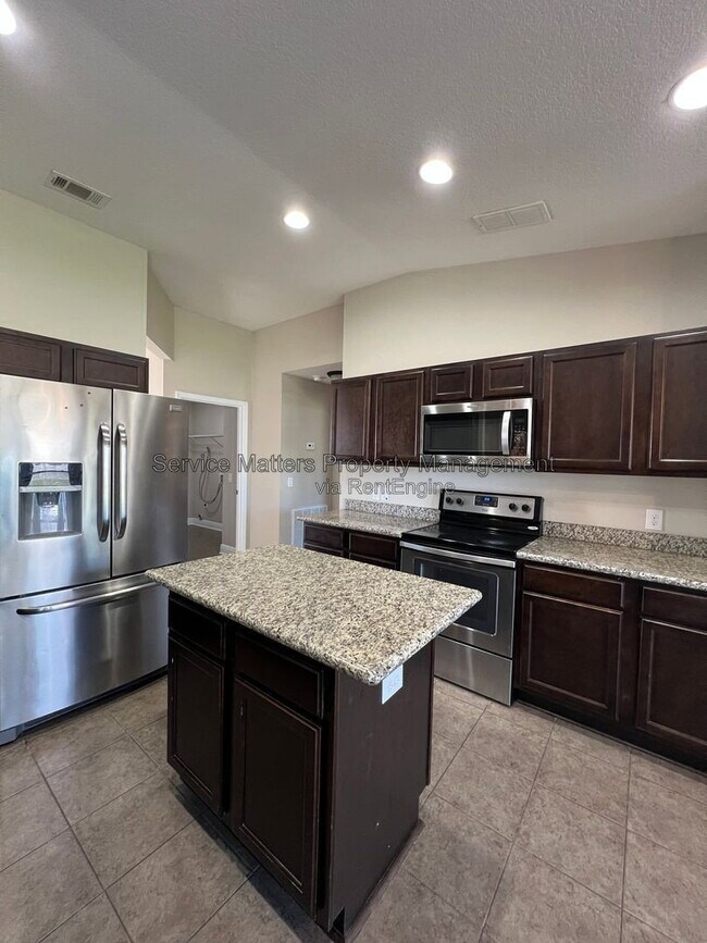 Building Photo - 7045 Harvest Way