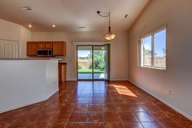 Building Photo - 5879 N Bronco Ln