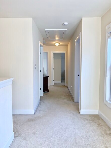 Upstairs Hallway + attic storage - 1359 Micahs Way N