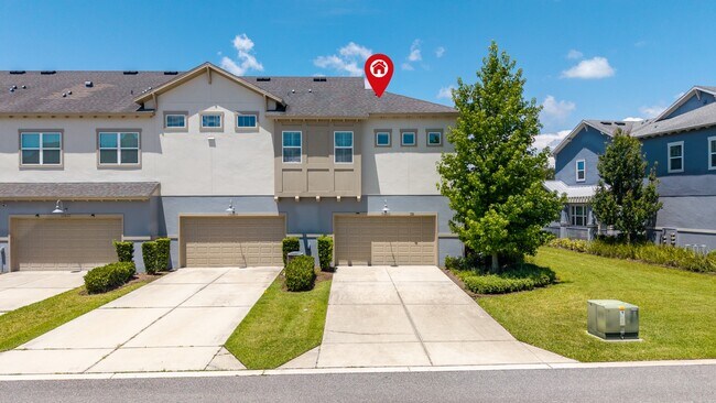 Building Photo - Move In Ready End Unit Townhome in Laureate Park | 3 Bed | Tesla Charger