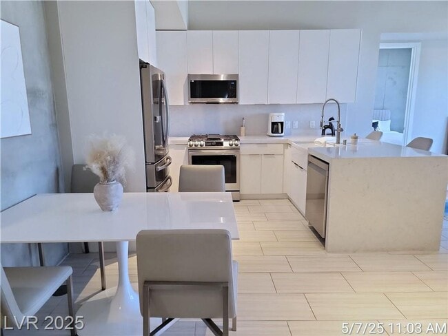 Building Photo - Welcome to effortless luxury living at The...