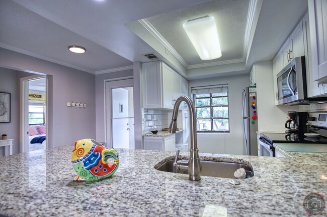 Building Photo - Seasonal Short-Term 2-Bedroom 2-Bath 2nd Floor Condo Located at Mission Lakes!