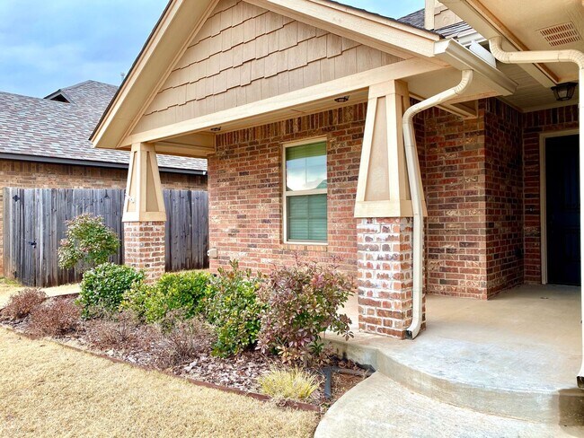 Building Photo - Cute Home In Mustang Schools With Storm Sh...