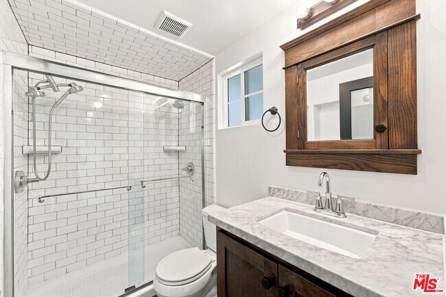 Building Photo - 4415 Woodland Ave