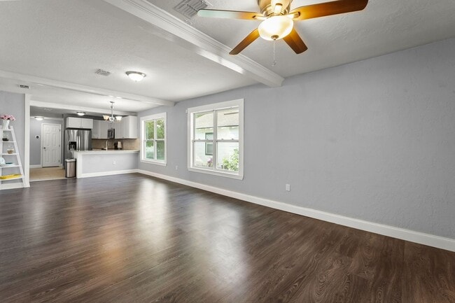 Building Photo - Home Sweet Home with Fire Pit & Modern Tou...