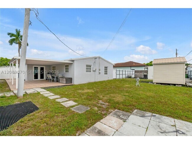 Building Photo - 6049 W 14th Ln