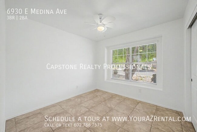 Building Photo - 6930 E Medina Ave