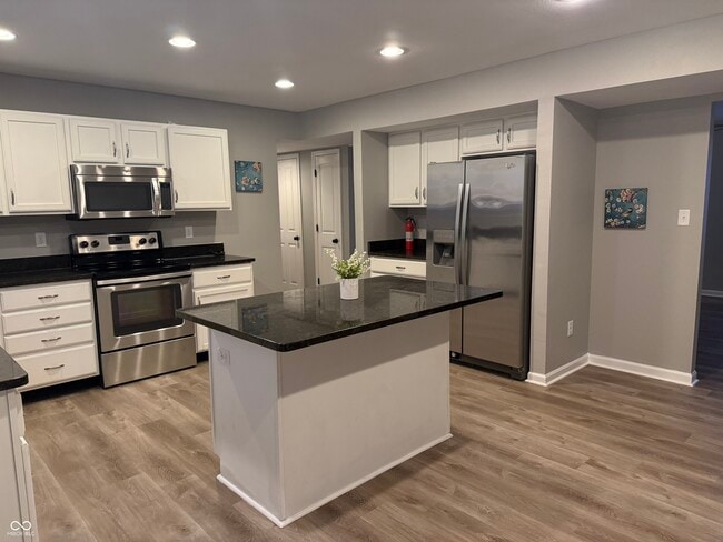 Building Photo - 6521 Rushing River