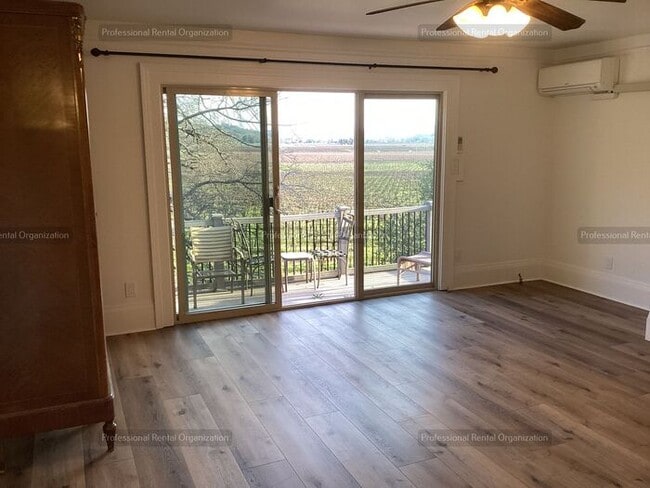 Building Photo - Upper Carriage house Flat with deck & expansive Vineyard and Sunset views