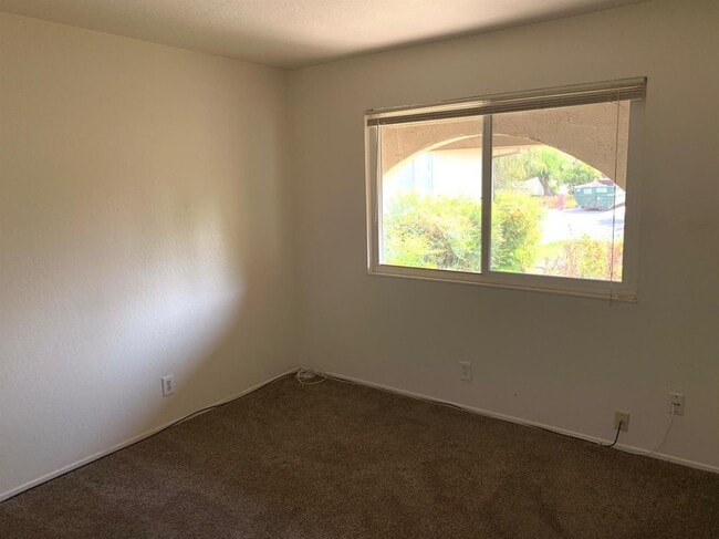 Building Photo - Enjoy the Backyard Pool at This 4-Bedroom ...