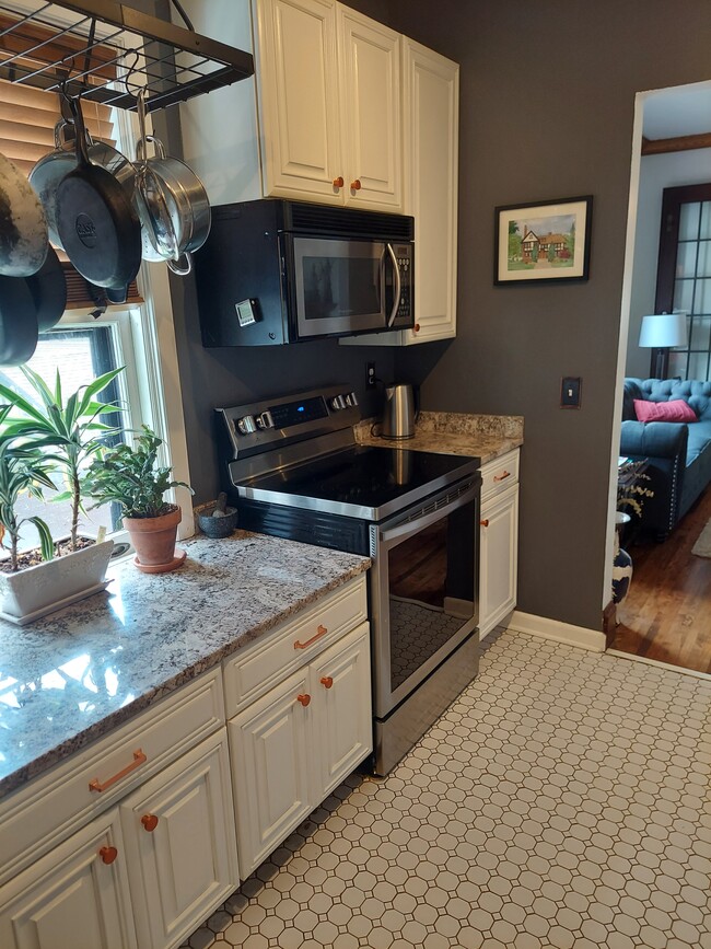 Kitchen with updated stainless steel appliances - 2219 Pillsbury Ave S