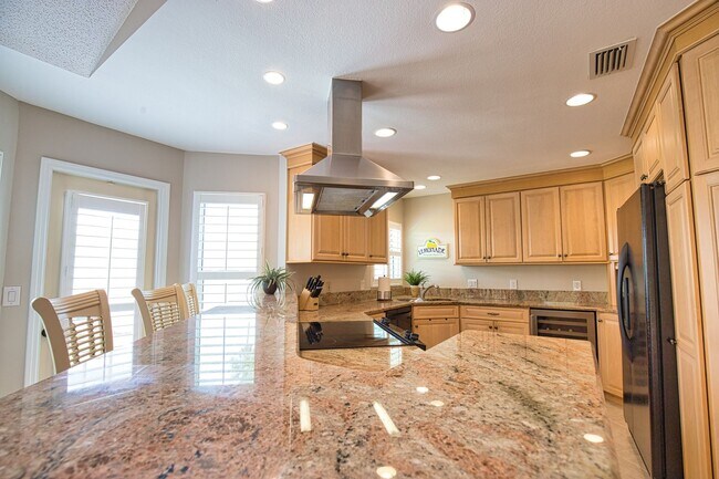 Building Photo - Seasonal Short-Term 2 Bed 2 Bath Heated Pool Villa with a Den in Harrington Lakes at Planation Go...