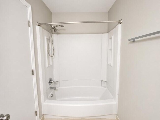 Building Photo - Welcome home to the perfect blend of peaceful country charm and modern city living!