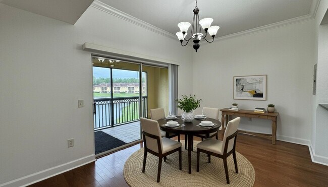 Building Photo - Gated 2 Bed/ 2.5 Bath Condo with 24/7 Security & Monitoring! Screened in Lanai with Water Views!