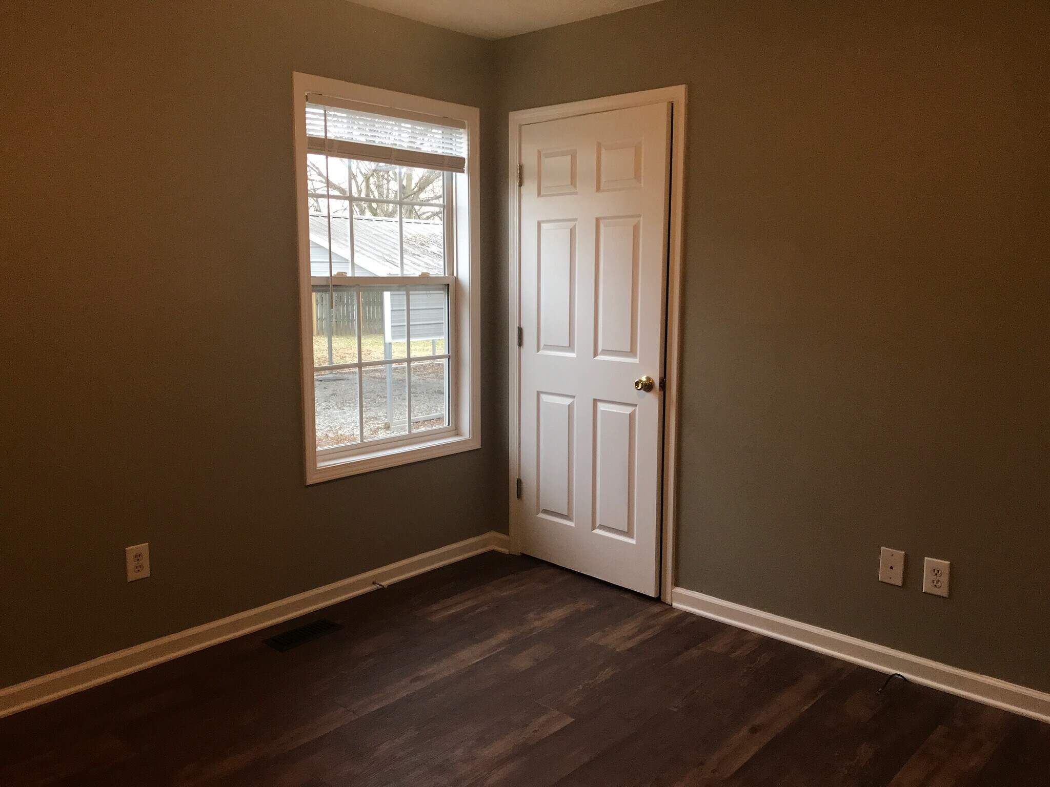 Bedroom 1 freshly painted and new flooring. - 216 Winters St