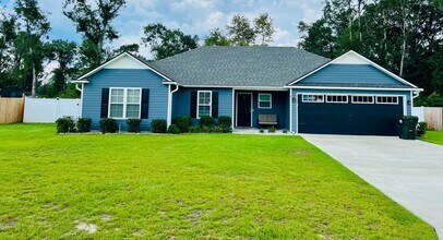 Building Photo - Modern 4-Bedroom Home with Open Layout, Sp...