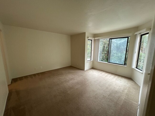 Building Photo - Large 2 BR / 2 BA featuring Cathedral Ceilings, Washer & Dryer, Plus Parking Included!