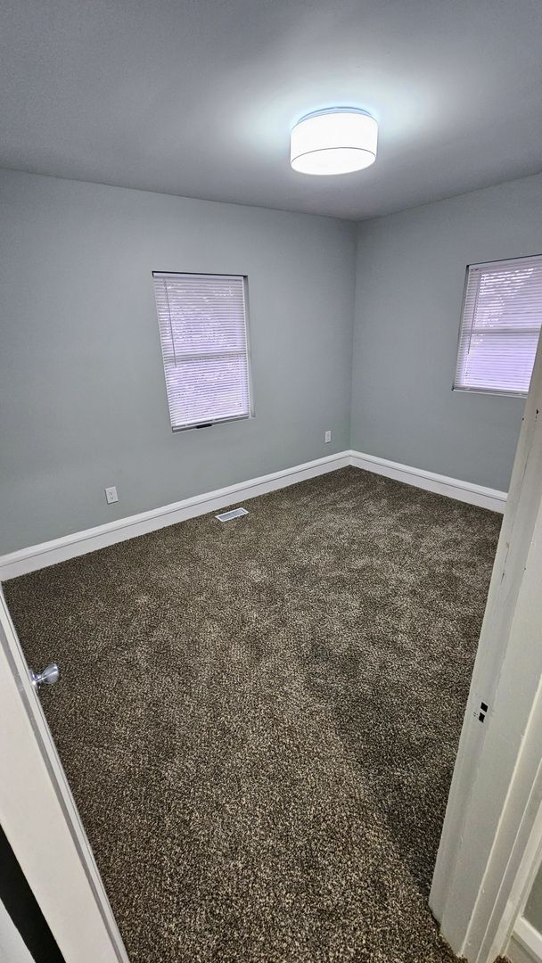 Building Photo - Stunning Renovation Ready for Your Finishing Touches!