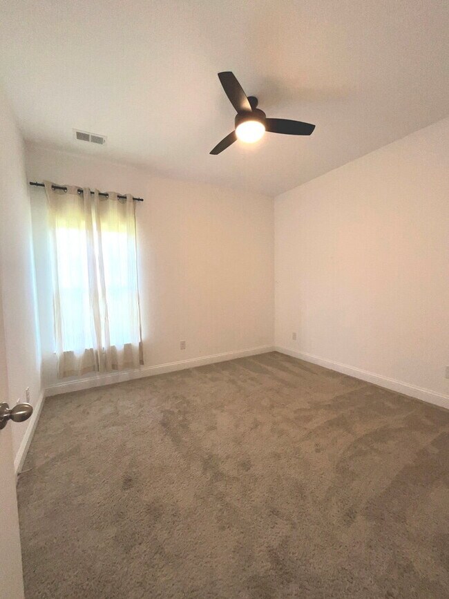 Building Photo - "Spacious 4-Bed Oasis with Stunning Lake V...