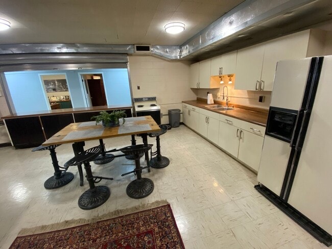 Building Photo - Furnished Loft-Style Apartment