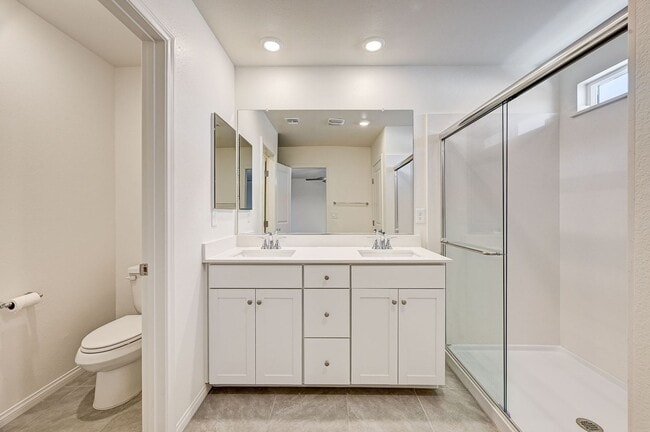 Building Photo - Beautiful two-story rental home featuring 4 bedrooms, 3 bathrooms, and a 2-car garage.