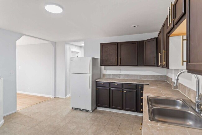 Building Photo - "Spacious 3-Bedroom Retreat at 57 1/2 Sara...