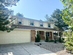 Building Photo - "Spacious 4-Bedroom Retreat with 2.5 Baths...