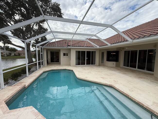 Building Photo - Luxurious 4 Bedroom 3 Bath Lakefront Pool Home W/3-Car Garage