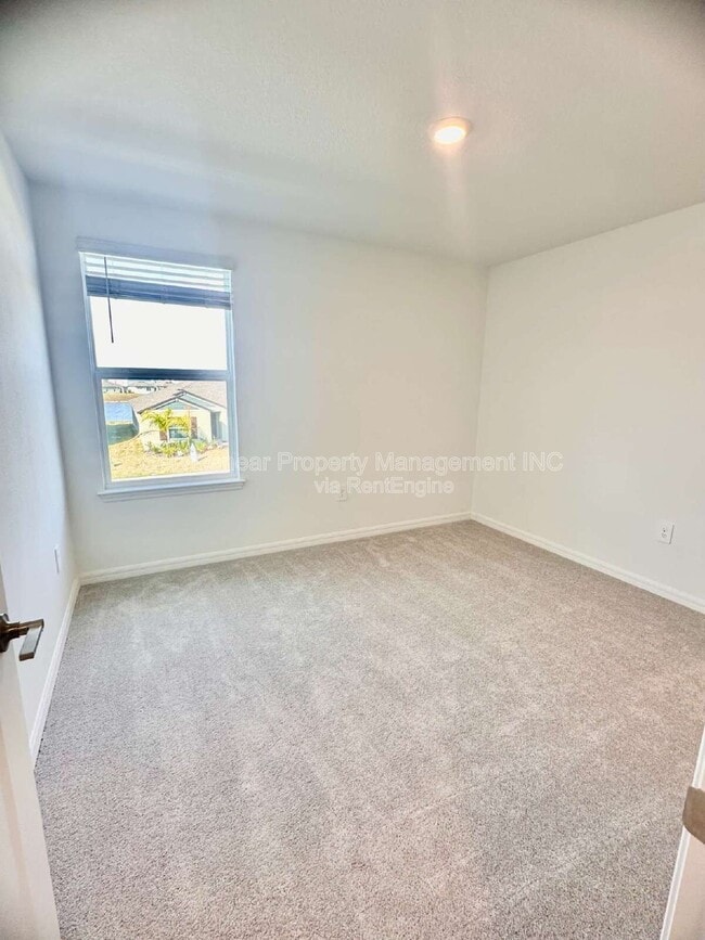 Building Photo - 8406 Blue Wave Ln E