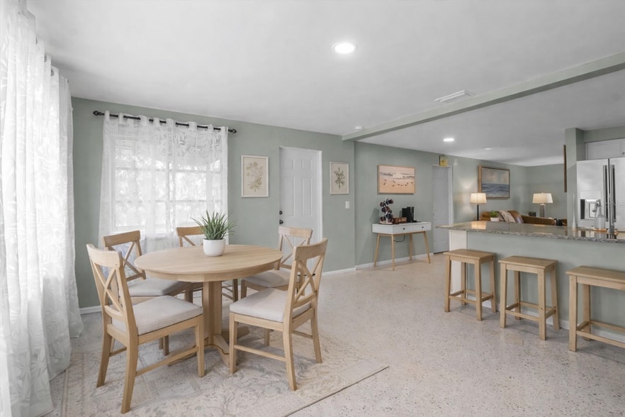 Dinning Room- Furniture shown in photos may vary, as some pieces were used for staging. We are curre - 709 84th St NW