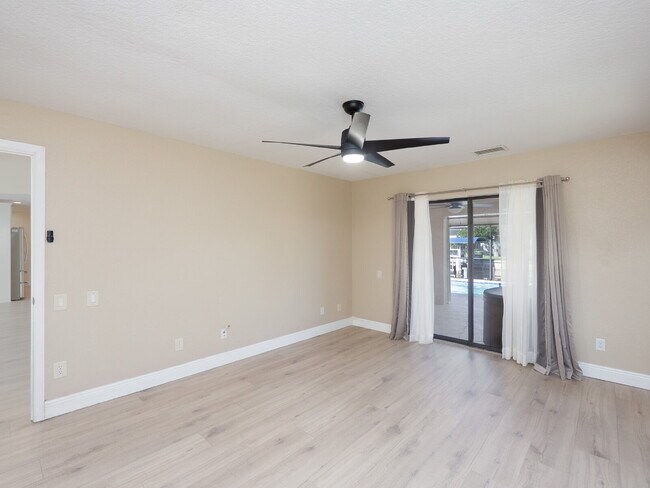 Building Photo - 3 BEDROOM • 2 BATHROOM • PRIVATE POOL • WATERFRONT • BOAT LIFT • ZERO DEPOSIT MOVE-IN AVAILABLE