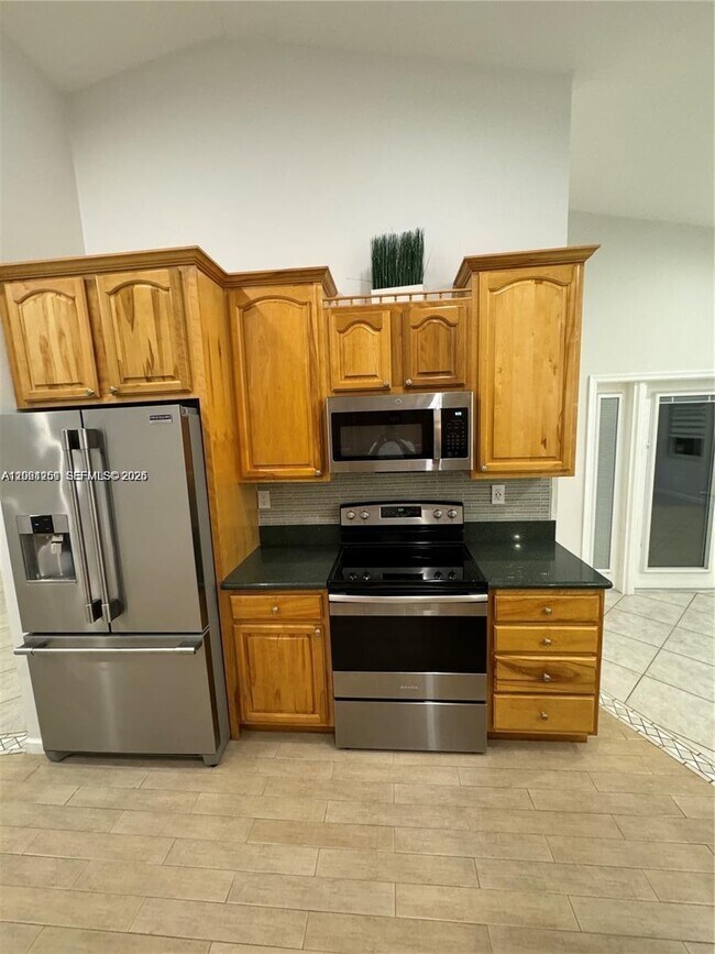 Building Photo - 8965 SW 59th Ct