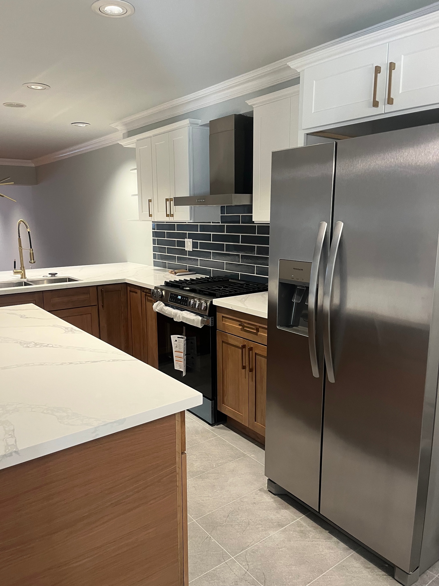 White Oak kitchen with quartz countertops - 6221 Monterey Rd