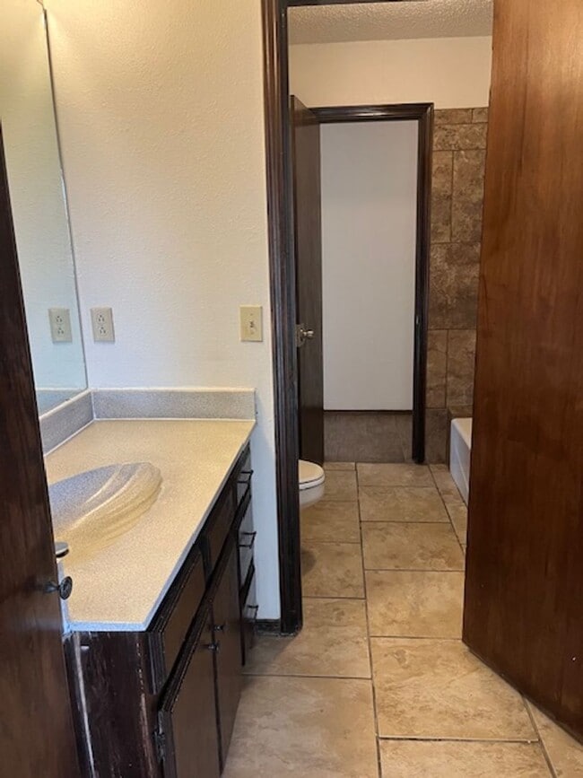 Building Photo - 3200 Wind Song Dr